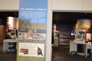 This photo shows the entrance to the Hallaton Treasure gallery, between the two help desks. There is a column in the middle.